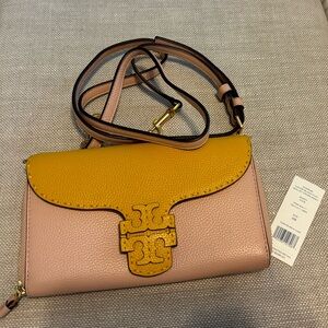 Tory Burch Wallet with Straps to carry as small crossbody